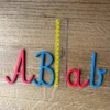 Ruchomy Alfabet Montessori - 102 Litery do Nauki Pisania